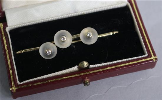 Three 14ct gold, rock crystal and diamond set dress buttons.